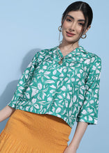 Women's and girls' floral crop shirts in cotton fabric bring breezy, feminine charm with vibrant prints and a cropped silhouette for casual summer vibes